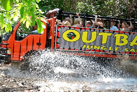 Tourist in the Outback truck crossing a river Punta Cana